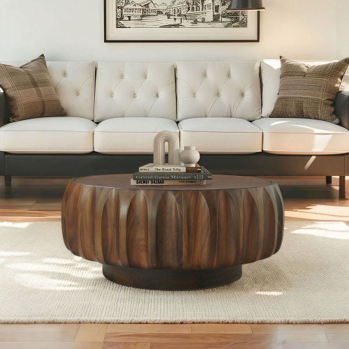 Modern living room with a beige sectional sofa and wooden coffee table.